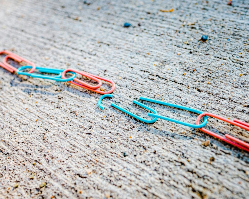 research recruitment is broken - image of a paperclip chain broken